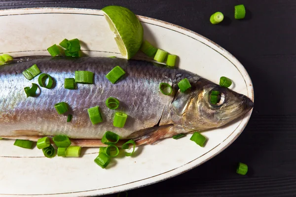 Herring with green onion — Stock Photo, Image