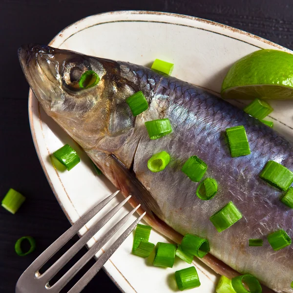 Herring with green onion — Stock Photo, Image