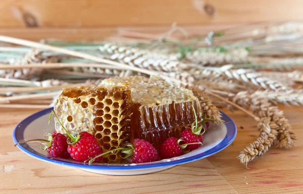 Honung och hallon — Stockfoto