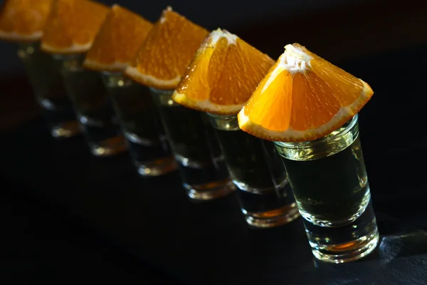 Gold tequila with orange — Stock Photo, Image