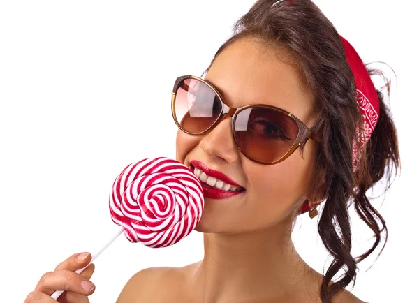 Young beautiful woman with candy — Stock Photo, Image