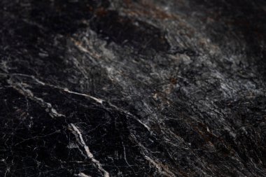 Siyah mermerden iplikli arkaplan için soyut doku.