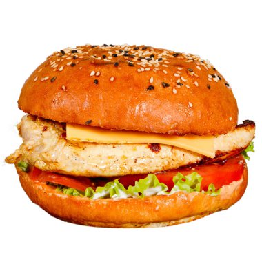 Lezzetli, lezzetli hamburger pirzola, salata, domates, sos, soğan, mayonez bir kafede bir tabakta.