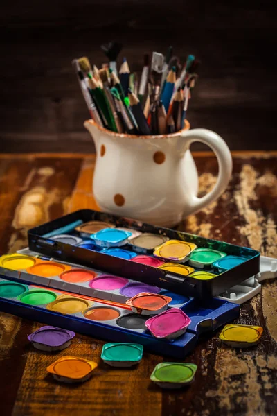 Watercolors and brushes — Stock Photo, Image