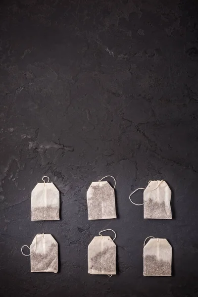 Assorted Tea Bags Black Stone Background — Stock Photo, Image