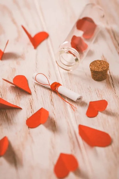 Love Message Bottle Paper Hearts Wooden Background Happy Valentine — стоковое фото