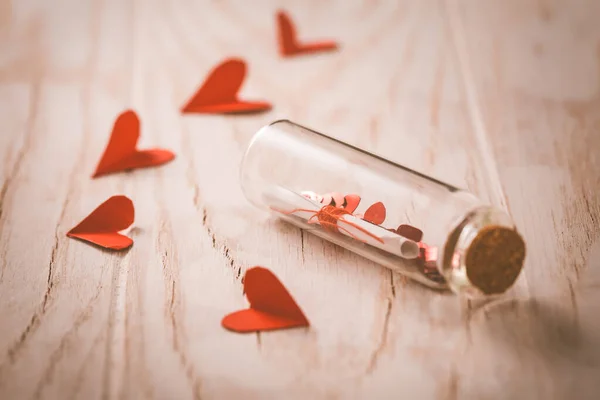 Love Message Bottle Paper Hearts Wooden Background Happy Valentine — стоковое фото