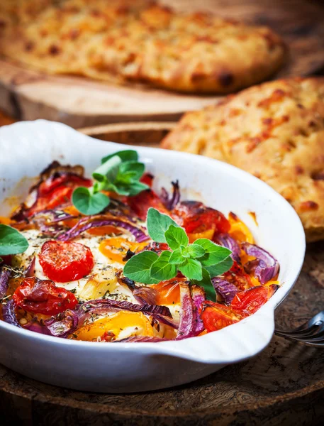 Baked feta cheese with vegetables — Stock Photo, Image