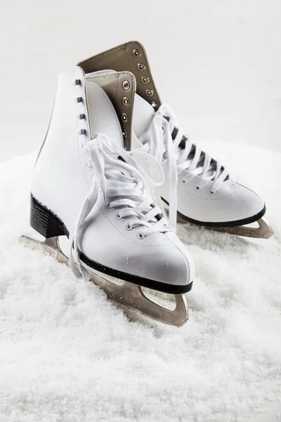 Ice skates with cap — Stock Photo, Image