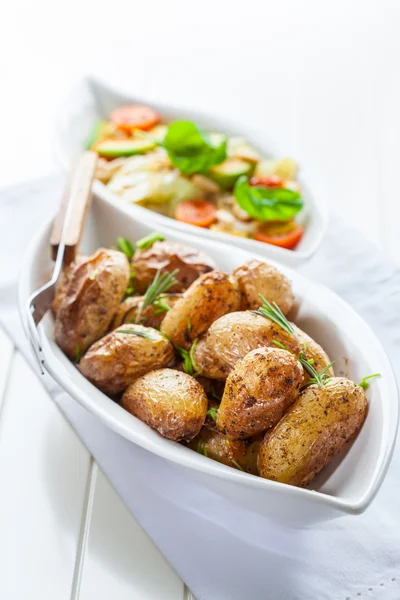 Rustic oven baked potatoes — Stock Photo, Image