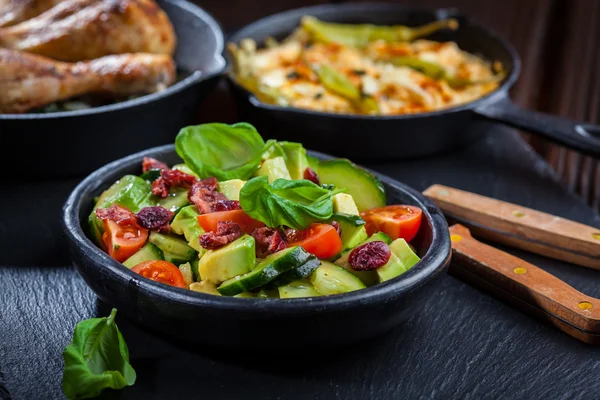 Avocado salad and other appetizers — Stock Photo, Image