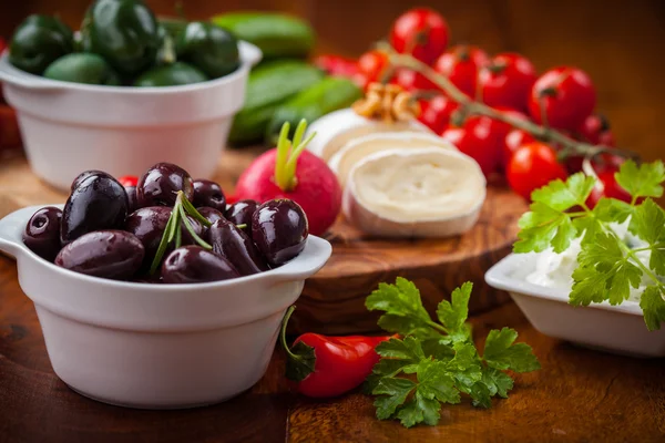 Raw snack with antipasti — Stock Photo, Image