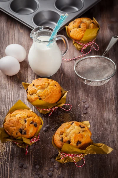 Homemade muffins with baking ingredients — Stock Photo, Image