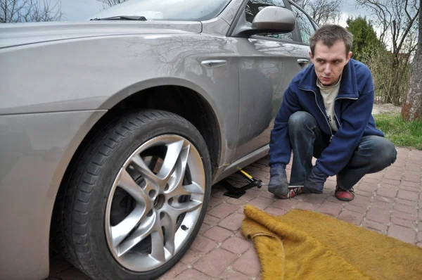 Wheel changing Stock Photo