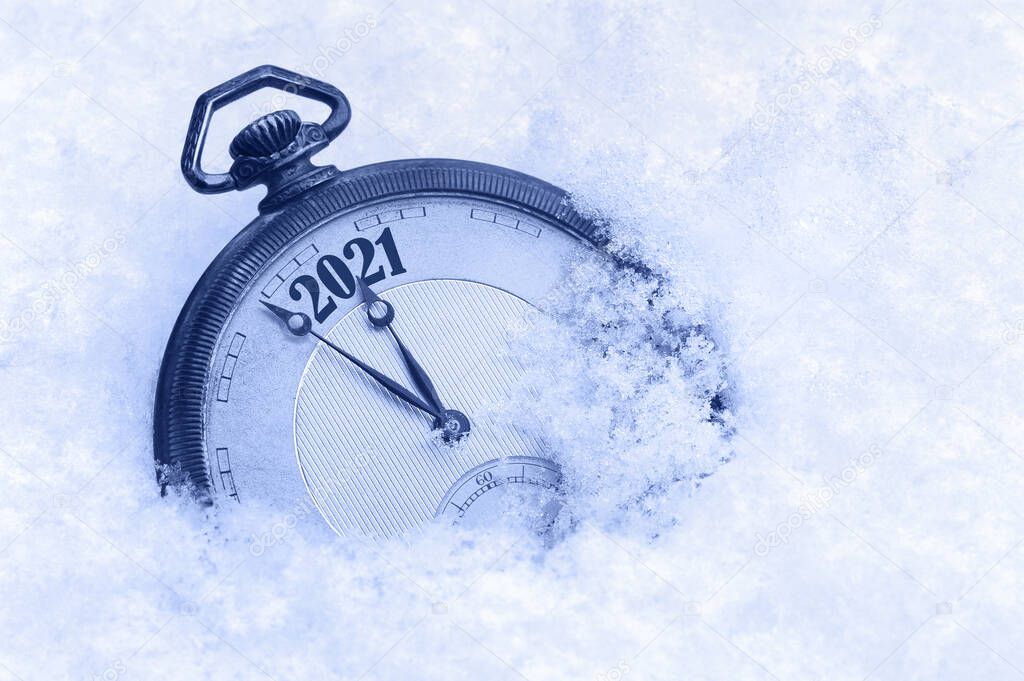 New Year 2021 greeting card, 2021 new year, pocket watch in snow, happy new year concept, countdown to midnight, clock in snow
