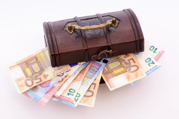 Euro banknotes laying in treasure chest — Stock Photo, Image