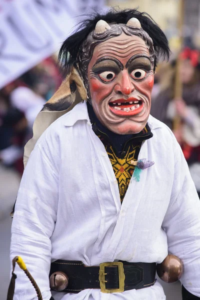 Carnival parade with carved wooden mask designed as scary ghost — Stock Photo, Image
