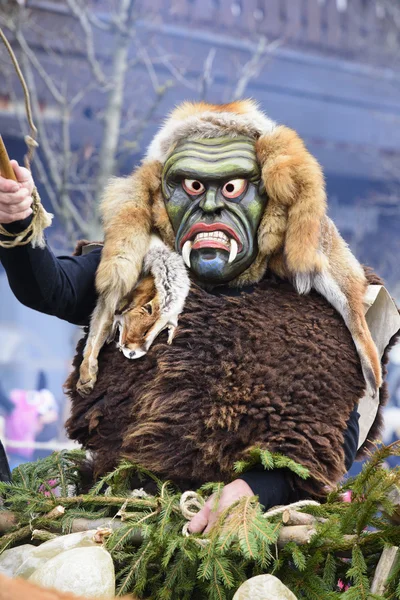 Carnival parade with carved wooden mask designed as scary ghost — Stock Photo, Image