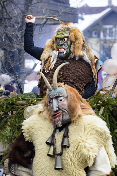 Carnival parade with carved wooden mask designed as scary ghost — Stock Photo, Image