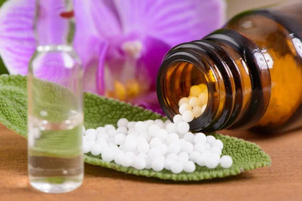 Alternative medicine with herbal pills — Stock Photo, Image