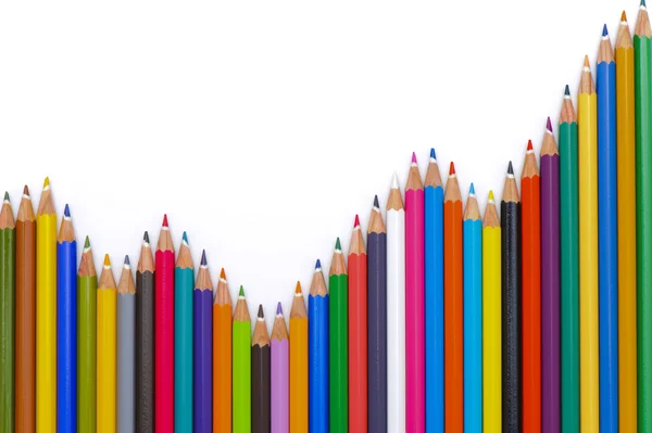 Colorful pencils show chart and success at stock market — Stock Photo, Image