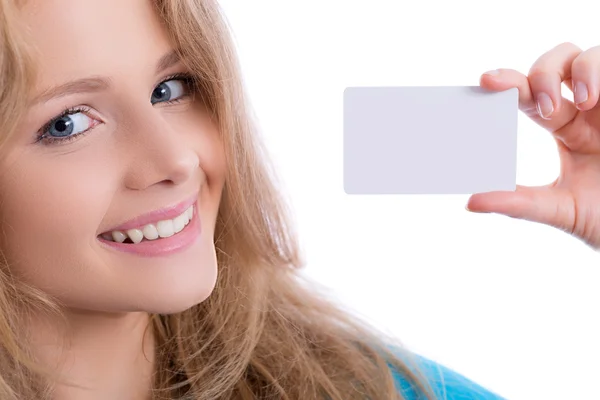 Beautiful blond girl showing business card — Stock Photo, Image