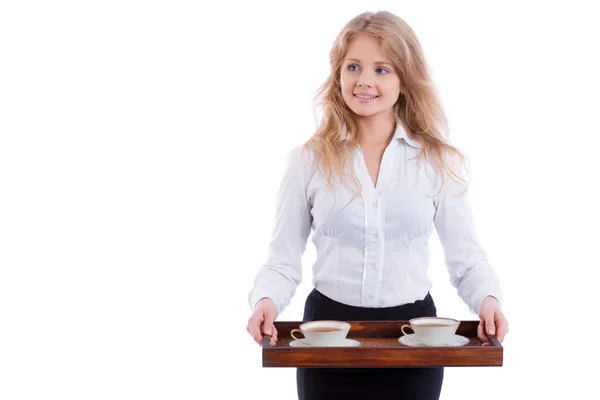 Young blond waitress with tray and two cups of tea, isolated — Stock Photo, Image