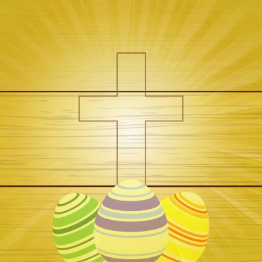 Paskalya yumurtaları ve ahşap arka plan üzerinde haç