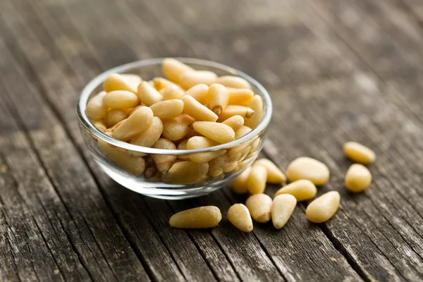 Pine nuts in bowl — Stock Photo, Image