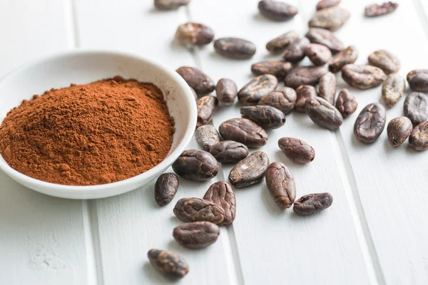 Cocoa powder and beans — Stock Photo, Image