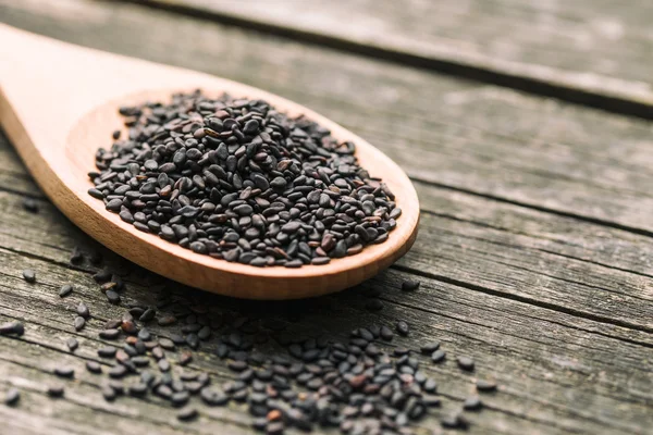 Black sesame seeds. — Stock Photo, Image