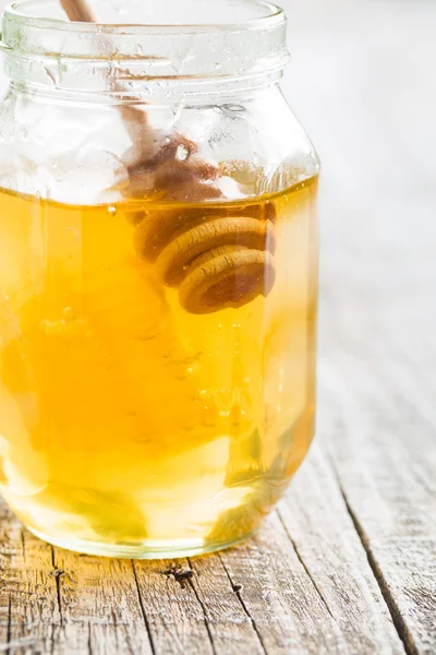 Hůl dřevěná medu. — Stock fotografie