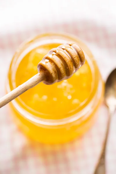 Wooden honey stick. — Stock Photo, Image