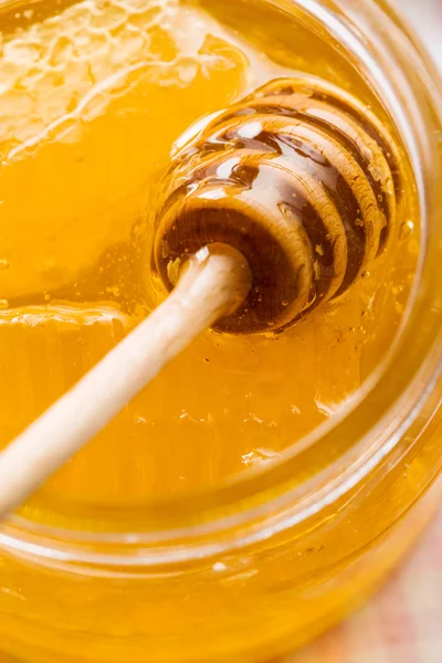 Wooden honey stick. — Stock Photo, Image