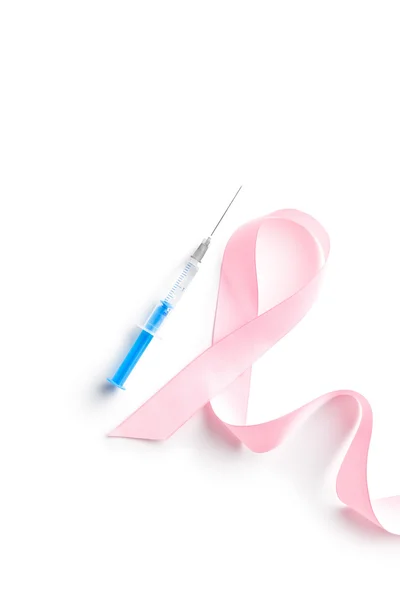 Pink ribbon and syringe. — Stock Photo, Image