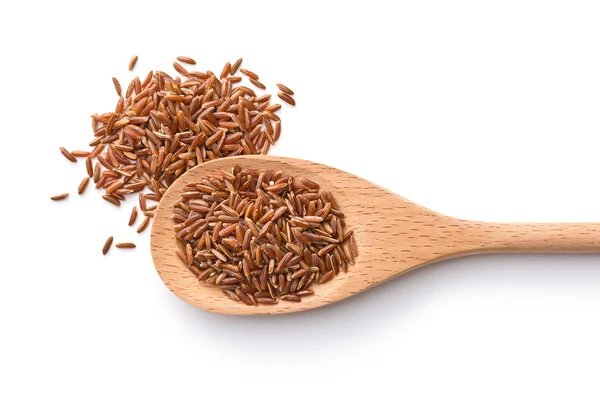 De rode rijst in houten lepel. — Stockfoto