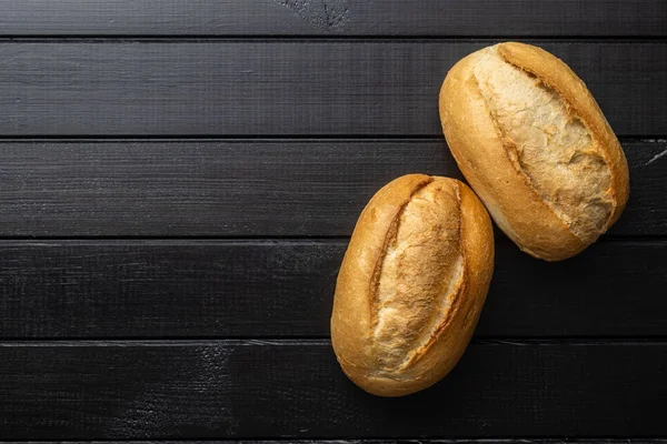 Two Mini French Baguettes Black Table Top View — Stock Photo, Image