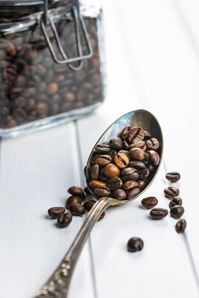 Roasted Coffee Beans Spoon White Table — Stock Photo, Image