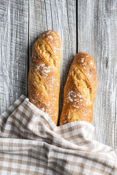 Two Crispy Fresh Baguettes Wooden Table Top View — Stock Photo, Image