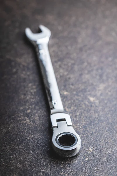 Stainless Steel Ratchet Wrench Black Table — Stock Photo, Image