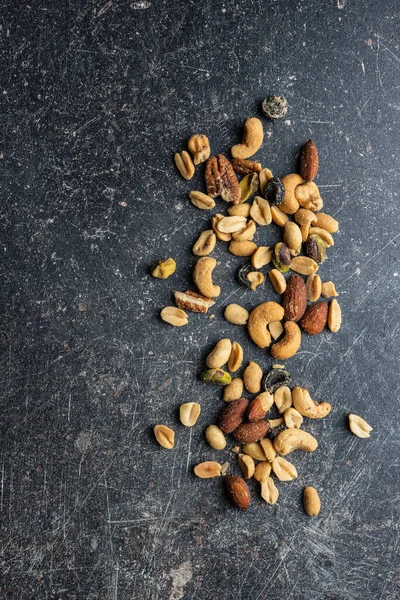 Mix Salted Nuts Black Table Top View — Stock Photo, Image