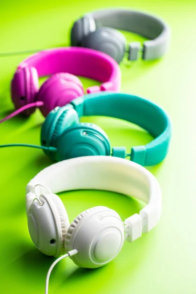 Coloful Wired Stereo Headphones Green Background — Stock Photo, Image