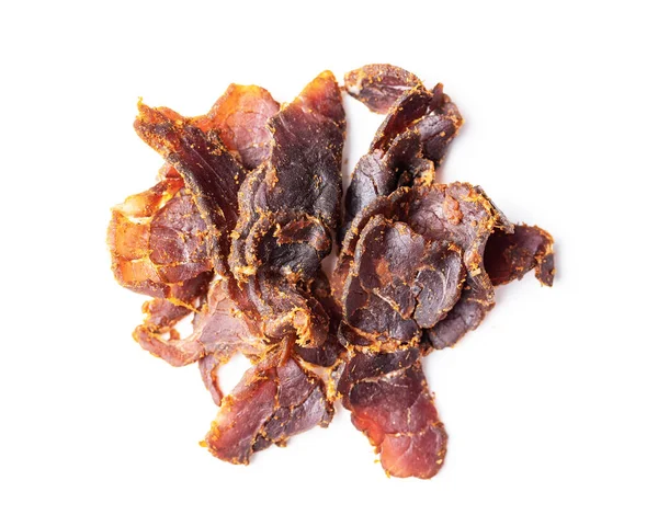 スライスされた牛肉のジャーキー 白地に隔離された干物 — ストック写真