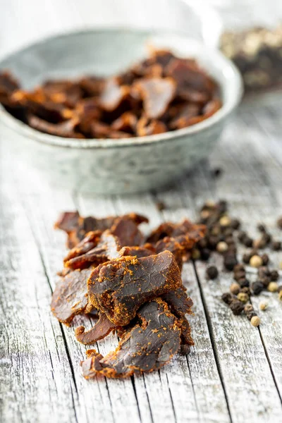 Sliced Beef Jerky Dried Beef Meat Wooden Table — Stock Photo, Image