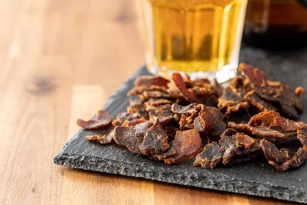 Sliced Beef Jerky Dried Beef Meat Wooden Table — Stock Photo, Image