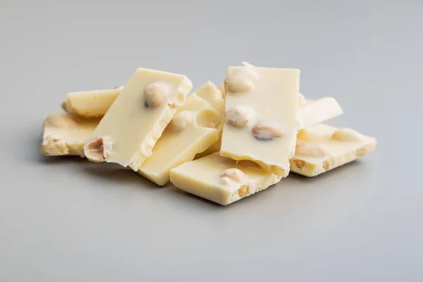 White Nutty Chocolate Hazelnuts Gray Background — Stock Photo, Image