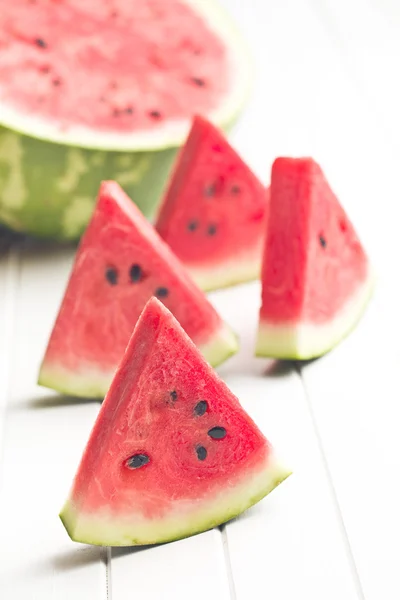 Sliced watermelon on kitchen table — Stock Photo, Image
