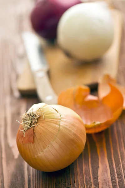 Various bulbs on wooden table — Stock Photo, Image