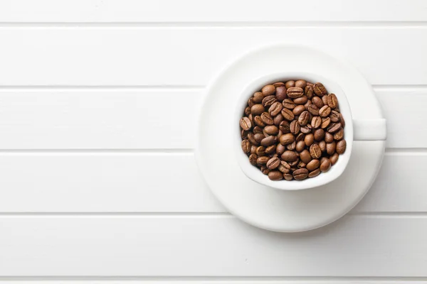 Kupa kahve çekirdekleri — Stok fotoğraf