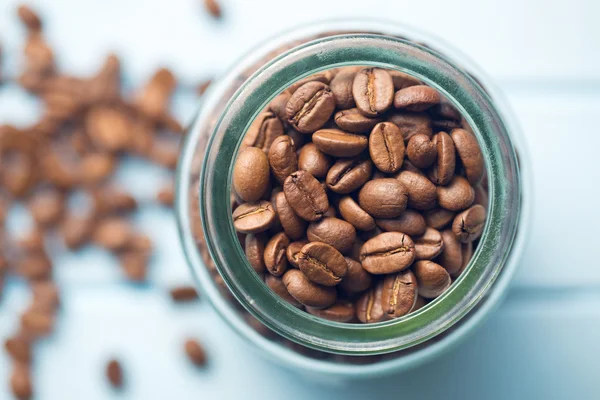 Granos de café en frasco — Foto de Stock